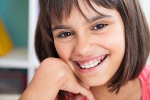 young girl with retainer 