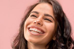 smiling girl with braces 