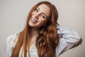 teen with clear braces 