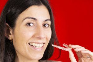 mature woman holding adult braces in Powell