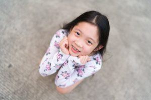 young girl with braces