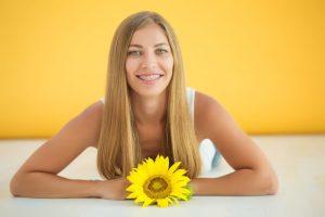teenage girl smiling with braces