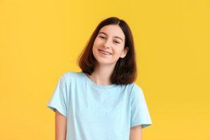 pre-teen girl with braces after seeing children’s orthodontist in Westerville