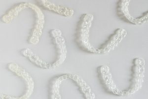 a bunch of clear aligners 