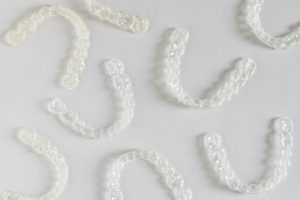 a bunch of clear aligners